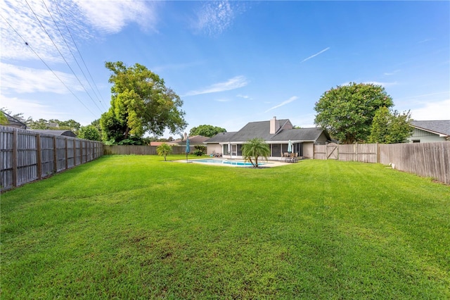 5361 Jade Cir, Belle Isle, FL 32812 - fenced backyard with a patio