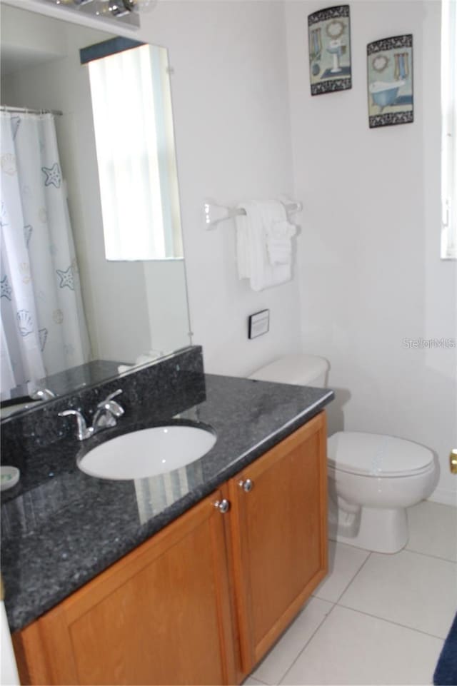 429 Belfry Dr, Davenport, FL 33897 - full bath featuring vanity and tile patterned floors