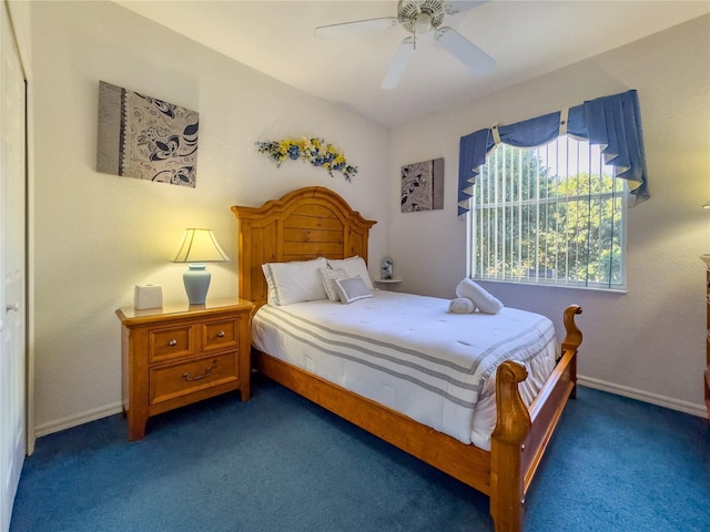429 Belfry Dr, Davenport, FL 33897 - carpeted bedroom with ceiling fan and baseboards
