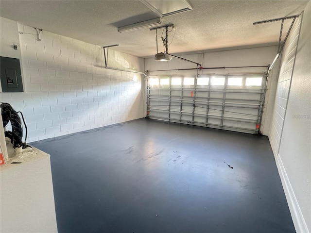 429 Belfry Dr, Davenport, FL 33897 - garage featuring electric panel, a garage door opener, and concrete block wall