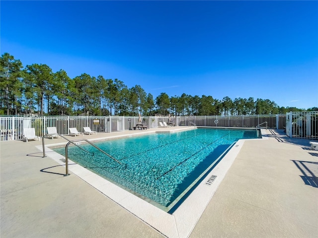 429 Belfry Dr, Davenport, FL 33897 - community pool featuring a patio area