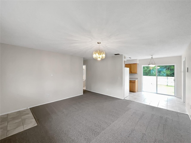 801 NE 4th Ave, Mulberry, FL 33860 - unfurnished living room featuring a chandelier and light carpet