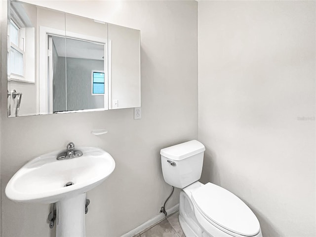 801 NE 4th Ave, Mulberry, FL 33860 - half bathroom featuring toilet and tile patterned flooring