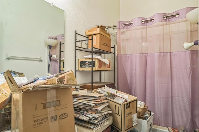 1902 Griffins Green Dr, Bartow, FL 33830 - full bathroom with a shower with shower curtain and a textured wall