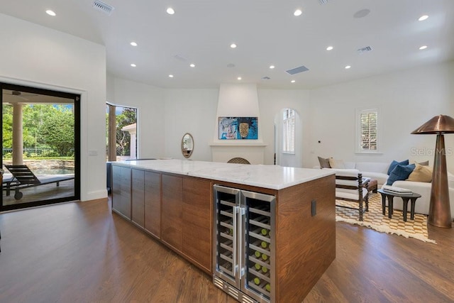 6186 Louise Cove Dr, Windermere, FL 34786 - kitchen featuring beverage cooler, healthy amount of natural light, dark wood finished floors, and recessed lighting
