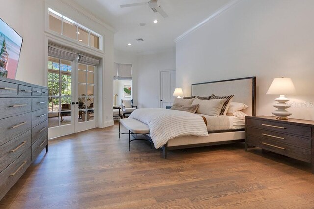 6186 Louise Cove Dr, Windermere, FL 34786 - bedroom featuring french doors, access to outside, dark wood-style floors, ornamental molding, and ceiling fan