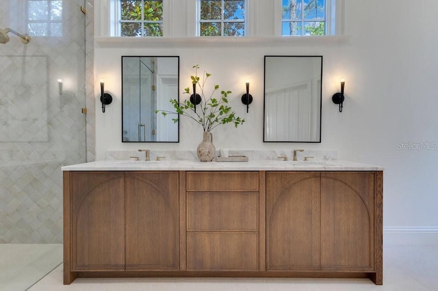 6186 Louise Cove Dr, Windermere, FL 34786 - full bath with double vanity, plenty of natural light, and tiled shower