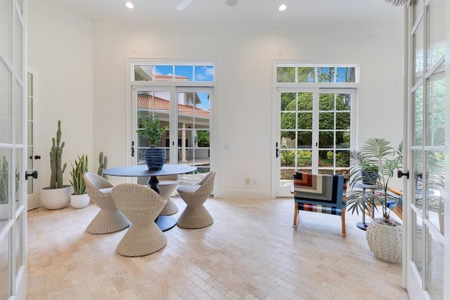 6186 Louise Cove Dr, Windermere, FL 34786 - dining space featuring french doors, hardwood / wood-style flooring, ornamental molding, and recessed lighting