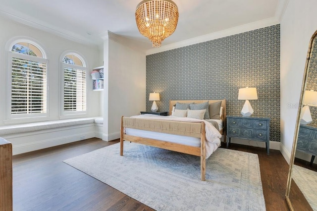 6186 Louise Cove Dr, Windermere, FL 34786 - bedroom with ornamental molding, a chandelier, wood finished floors, wallpapered walls, and an accent wall