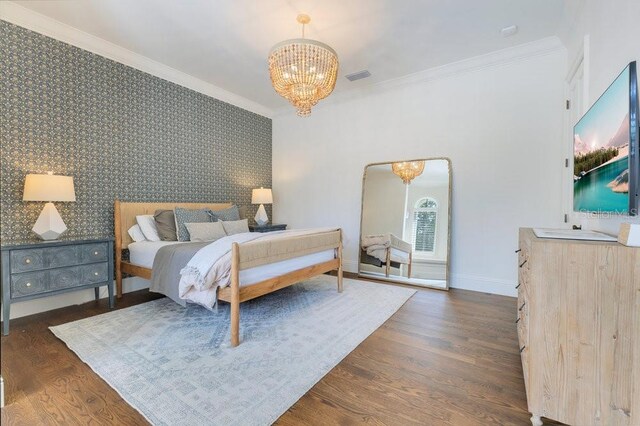 6186 Louise Cove Dr, Windermere, FL 34786 - bedroom featuring a chandelier, crown molding, wood finished floors, arched walkways, and wallpapered walls