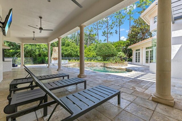 6186 Louise Cove Dr, Windermere, FL 34786 - view of patio featuring french doors, a ceiling fan, and an outdoor pool