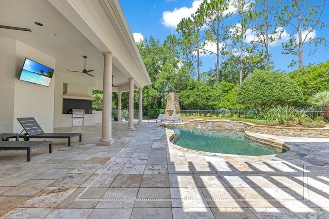 6186 Louise Cove Dr, Windermere, FL 34786 - outdoor pool featuring exterior kitchen, a patio, and ceiling fan