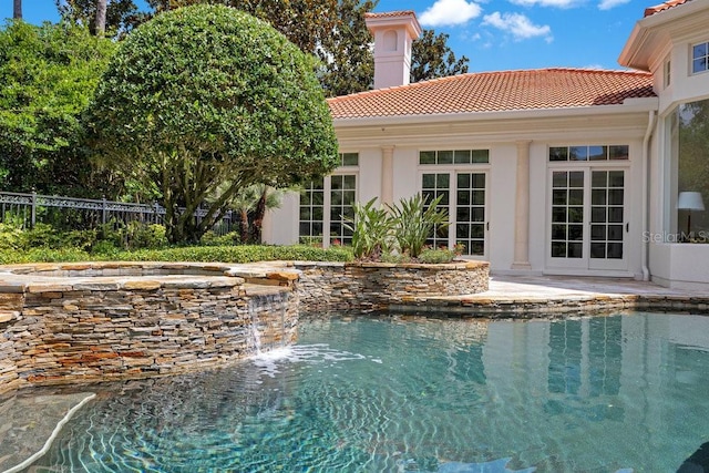 6186 Louise Cove Dr, Windermere, FL 34786 - view of swimming pool featuring a pool with connected hot tub and a patio area