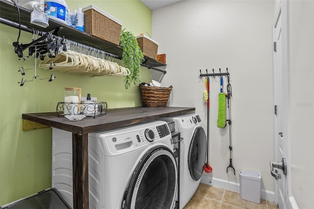 5723 Tarleton Way, Mount Dora, FL 32757 - laundry area featuring separate washer and dryer and light tile patterned floors