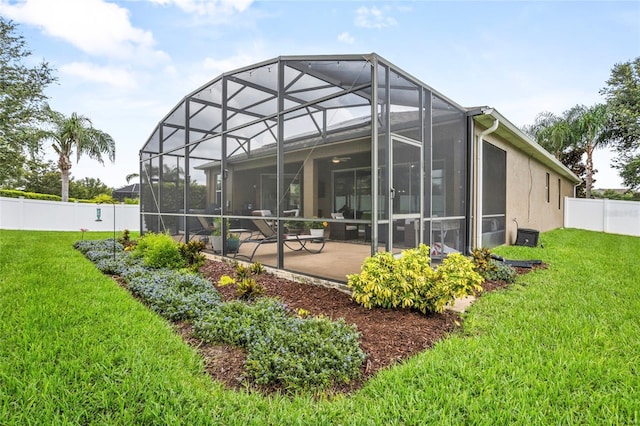 5723 Tarleton Way, Mount Dora, FL 32757 - back of house with a fenced backyard, a patio, and stucco siding