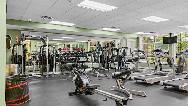5723 Tarleton Way, Mount Dora, FL 32757 - workout area featuring a drop ceiling