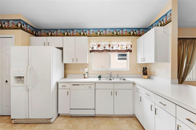 3707 Doune Way, Clermont, FL 34711 - kitchen with white appliances, light countertops, and white cabinetry