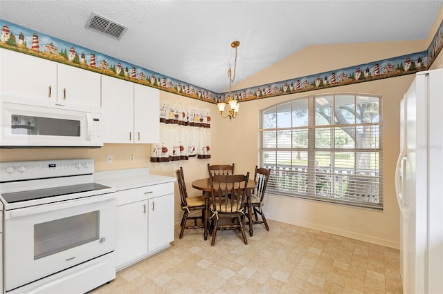 3707 Doune Way, Clermont, FL 34711 - kitchen with white appliances, white cabinetry, a chandelier, vaulted ceiling, and light countertops