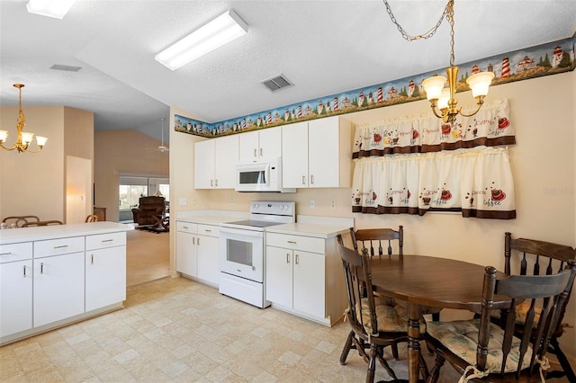 3707 Doune Way, Clermont, FL 34711 - kitchen featuring white appliances, a chandelier, light flooring, decorative light fixtures, and light countertops