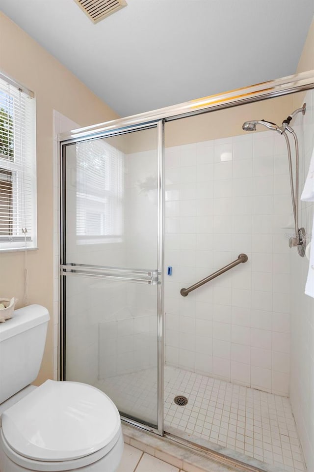 3707 Doune Way, Clermont, FL 34711 - bathroom featuring a stall shower and tile patterned flooring