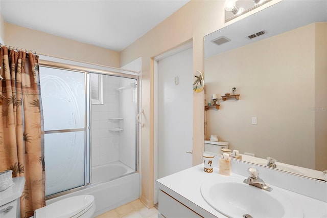 3707 Doune Way, Clermont, FL 34711 - full bathroom featuring vanity, shower / bath combination with glass door, and tile patterned flooring