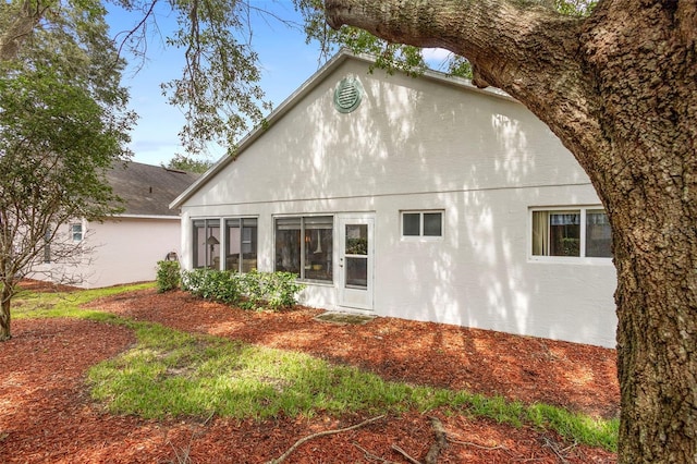 3707 Doune Way, Clermont, FL 34711 - rear view of house with stucco siding