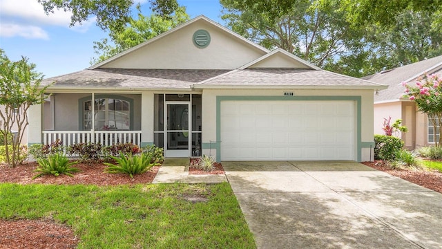 3707 Doune Way, Clermont, FL 34711 - view of front facade with an attached garage, stucco siding, roof with shingles, concrete driveway, and covered porch