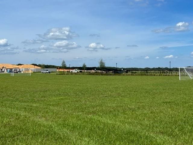 1876 Ross Hammock Ave, Groveland, FL 34736 - view of yard featuring a sport area