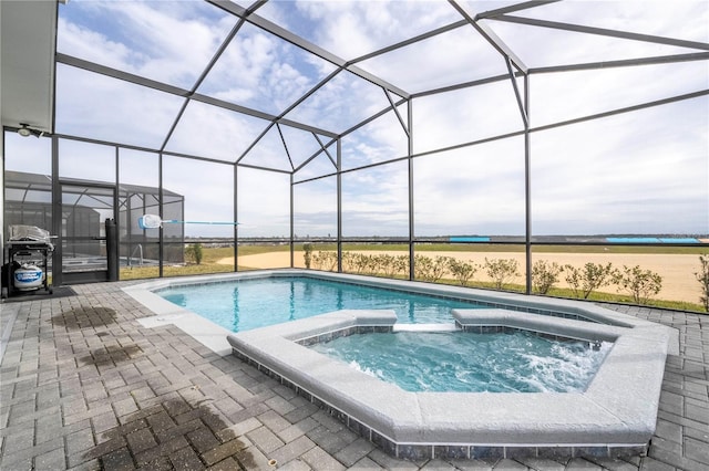 1907 Summer Dr, Davenport, FL 33897 - view of pool with a patio, a pool with connected hot tub, and a lanai