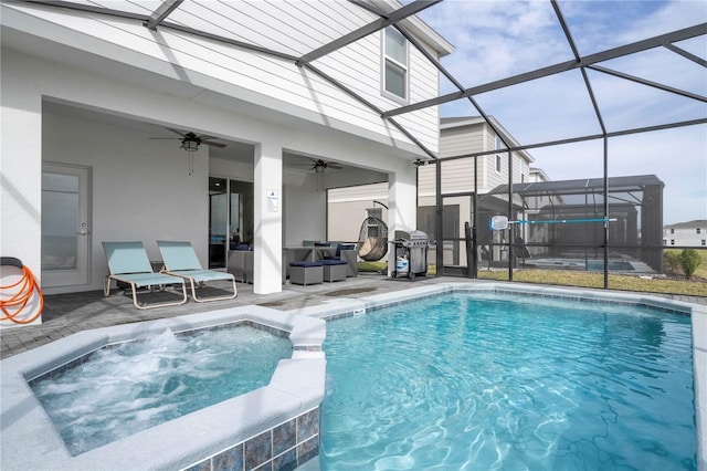 1907 Summer Dr, Davenport, FL 33897 - view of pool featuring a patio, a pool with connected hot tub, a ceiling fan, and a lanai