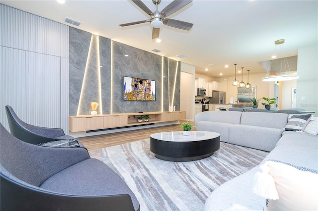 1907 Summer Dr, Davenport, FL 33897 - living room with ceiling fan, wood finished floors, and recessed lighting