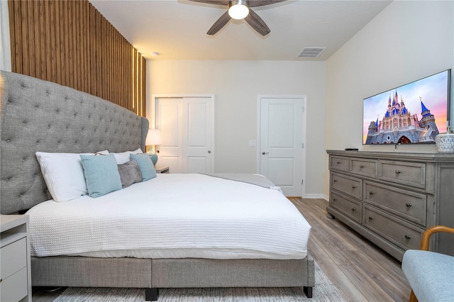 1907 Summer Dr, Davenport, FL 33897 - bedroom featuring light wood finished floors, a closet, and a ceiling fan