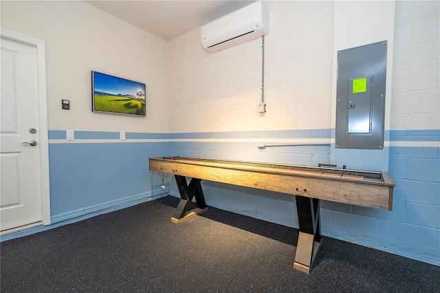1907 Summer Dr, Davenport, FL 33897 - rec room with electric panel, a wall unit AC, and concrete block wall