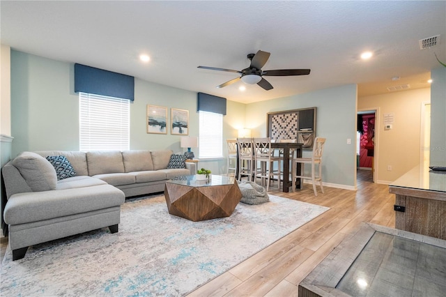 1907 Summer Dr, Davenport, FL 33897 - living area featuring a ceiling fan, wood finished floors, and recessed lighting