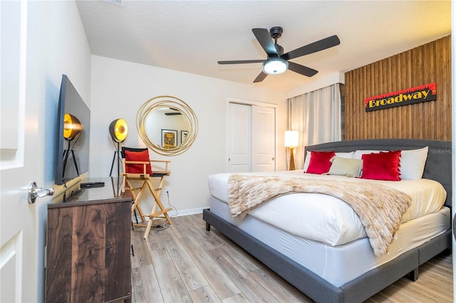 1907 Summer Dr, Davenport, FL 33897 - bedroom featuring wood finished floors, a closet, and ceiling fan