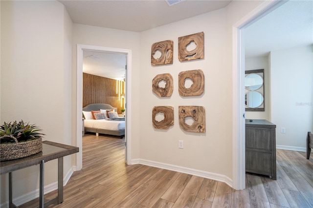 1907 Summer Dr, Davenport, FL 33897 - corridor featuring light wood-style floors and baseboards