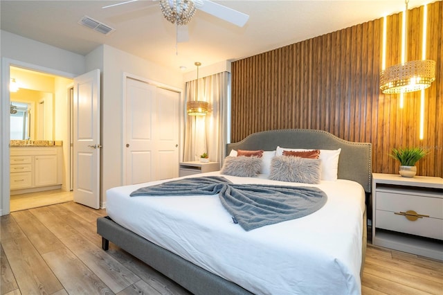 1907 Summer Dr, Davenport, FL 33897 - bedroom featuring light wood-type flooring, a closet, a skylight, and ceiling fan