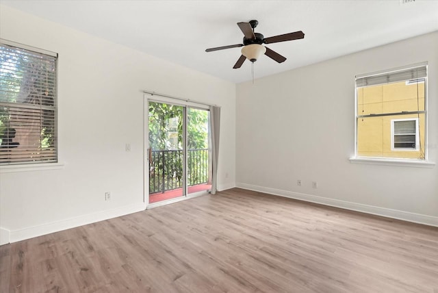 11 W Harding St Unit E, Orlando, FL 32806 - empty room featuring wood finished floors and ceiling fan