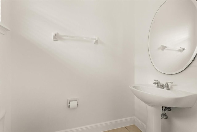 11 W Harding St Unit E, Orlando, FL 32806 - bathroom with baseboards and tile patterned flooring