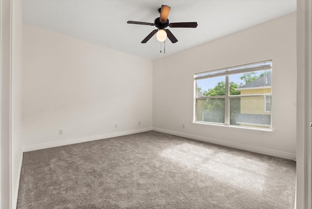 11 W Harding St Unit E, Orlando, FL 32806 - carpeted empty room with baseboards and a ceiling fan