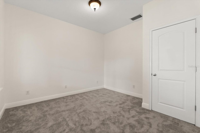 11 W Harding St Unit E, Orlando, FL 32806 - carpeted empty room with baseboards