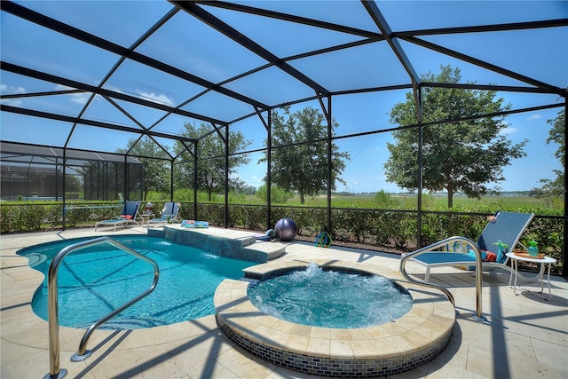 8020 Oak Shadow Ct, Davenport, FL 33837 - view of swimming pool with a pool with connected hot tub, a patio area, and a lanai
