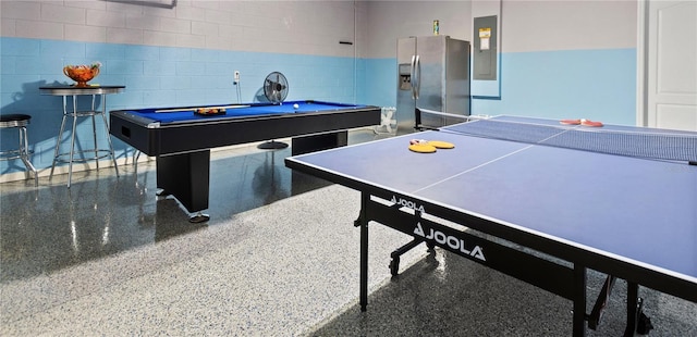 8020 Oak Shadow Ct, Davenport, FL 33837 - playroom with electric panel, billiards table, and speckle patterned floor