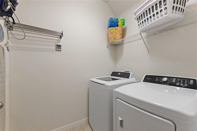 8020 Oak Shadow Ct, Davenport, FL 33837 - laundry area featuring separate washer and dryer and baseboards