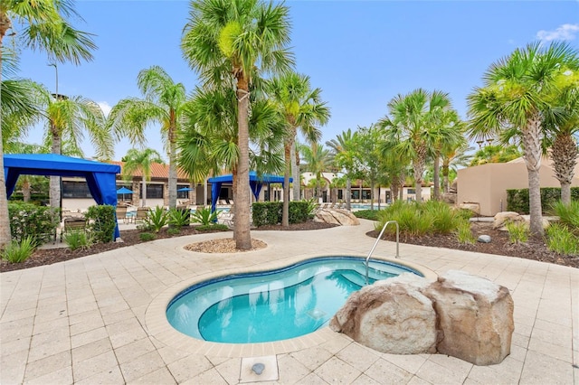 8020 Oak Shadow Ct, Davenport, FL 33837 - view of pool with a pool, a gazebo, and a patio