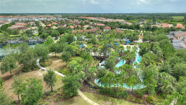 8020 Oak Shadow Ct, Davenport, FL 33837 - aerial view of property's location with a pool area and nearby suburban area
