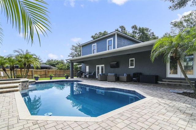 8445 Shady Glen Dr, Orlando, FL 32819 - view of pool with a patio, a fenced backyard, an outdoor living space, entry steps, and french doors