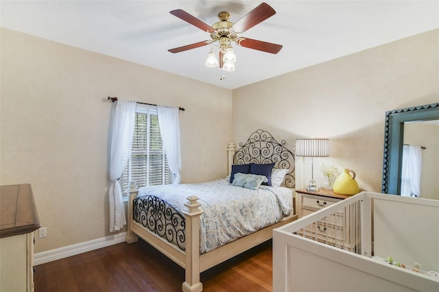 8445 Shady Glen Dr, Orlando, FL 32819 - bedroom featuring wood finished floors and a ceiling fan