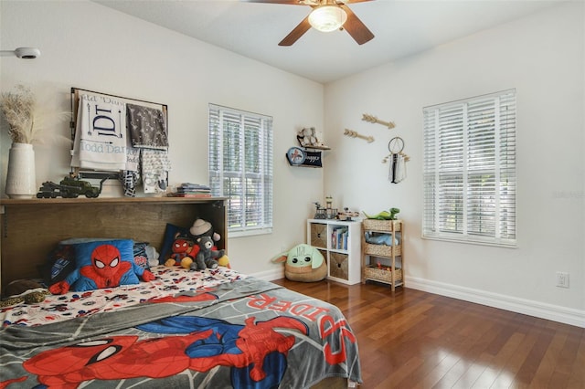 8445 Shady Glen Dr, Orlando, FL 32819 - bedroom with hardwood / wood-style floors and a ceiling fan