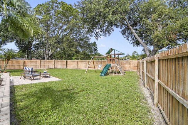 8445 Shady Glen Dr, Orlando, FL 32819 - fenced backyard with a playground and a patio